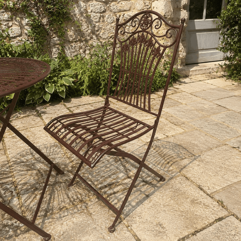 Romantic metal garden bistro set with folding chairs