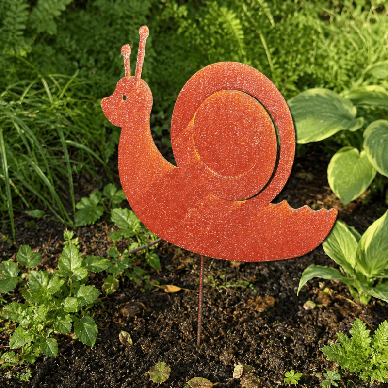 Decorative metal snail with raised spiral shell for flower beds