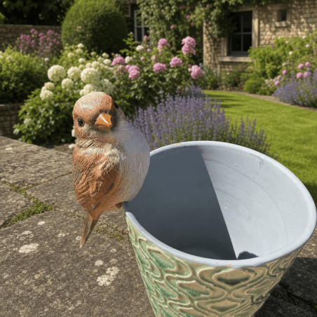Petit oiseau décoratif en résine à suspendre sur un pot