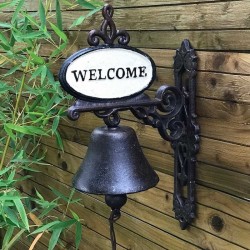 cast iron bell showcased at an entrance