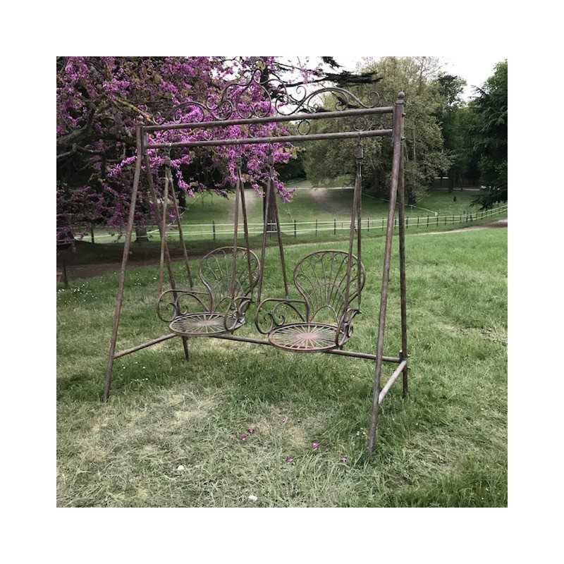 Comfortable Wrought Iron Garden Swing – Elegant Outdoor Setting