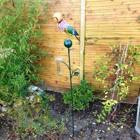 Decorative rain gauge with a colorful bird design