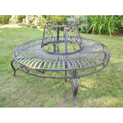 Full view of a patinated brown iron tree bench