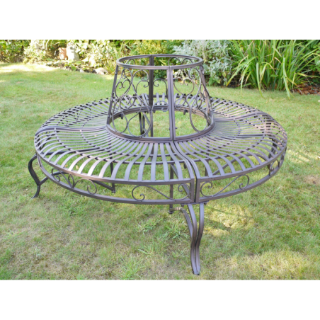 Full view of a patinated brown iron tree bench