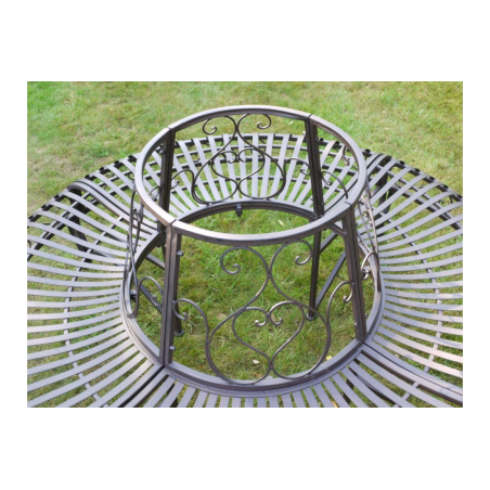 Top view of a patinated brown iron tree bench