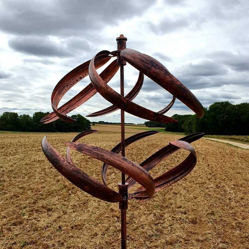 Decorative garden wind spinner in iron with brushed copper sphere, LANGEAIS model