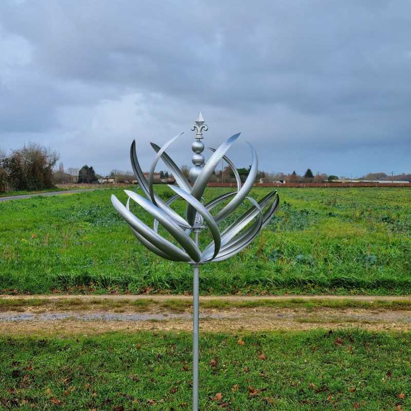 Decorative garden wind spinner in gray iron, Gonfreville windmill style, side view