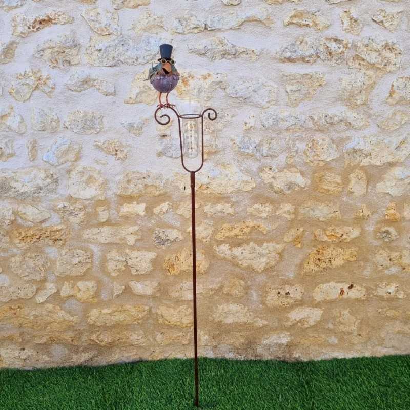 Decorative bird rain gauge model with hat and graduated funnel, full view