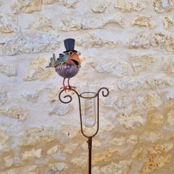 Decorative bird-shaped rain gauge with a hat and graduated funnel, front view