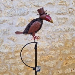 Garden mobile in iron with crow and woodpecker motif and balanced stake, side view