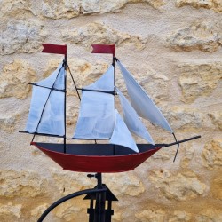 Marine-themed decorative garden balance in metal featuring a sailboat view