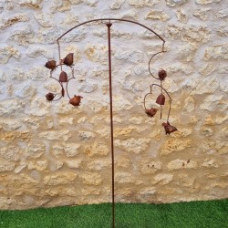 Decorative garden stake, cast iron bird bell, full view of the iron bird wind spinner