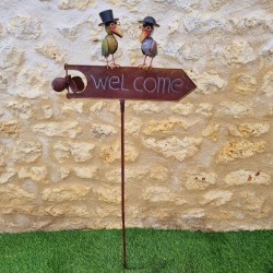 Decorative metal garden mobile featuring a Welcome sign and charming birds with hats.