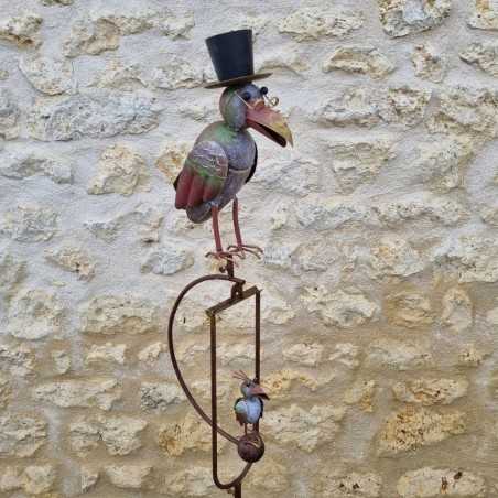 Garden mobile in iron featuring a colorful crow motif with its corbillat spike and balanced stake