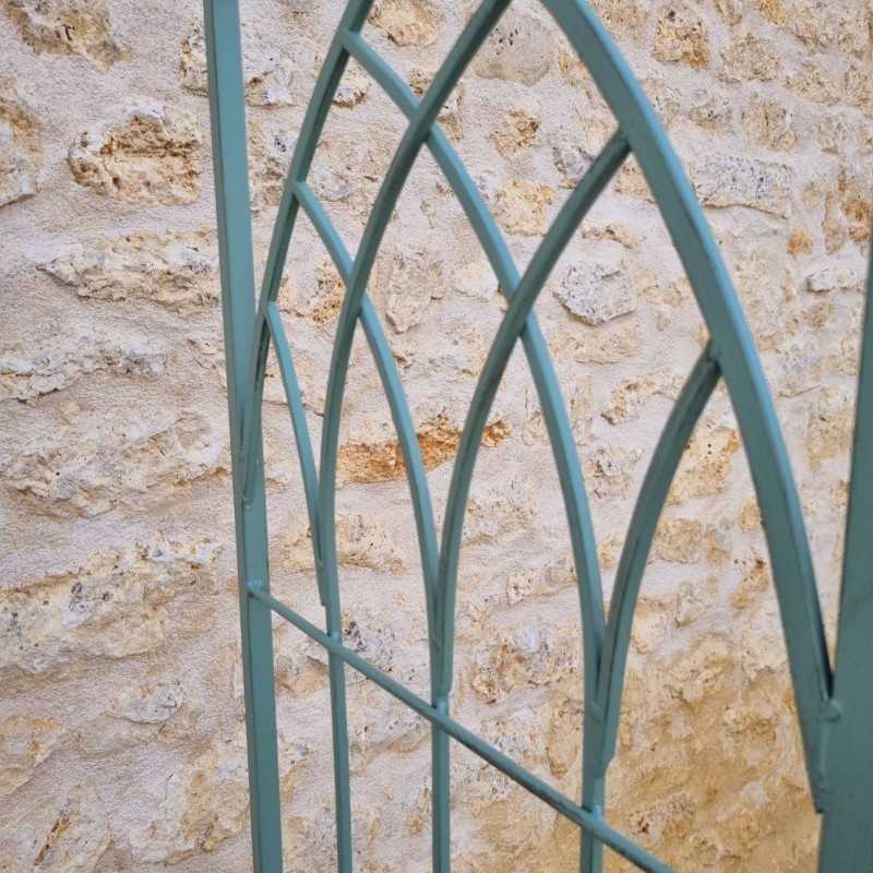 Comfortable antique green patinated wrought-iron garden arch bench