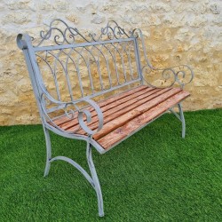 Comfortable antique gray weathered wrought-iron and wood garden bench