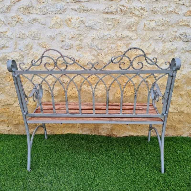 Comfortable antique gray weathered wrought-iron and wood garden bench