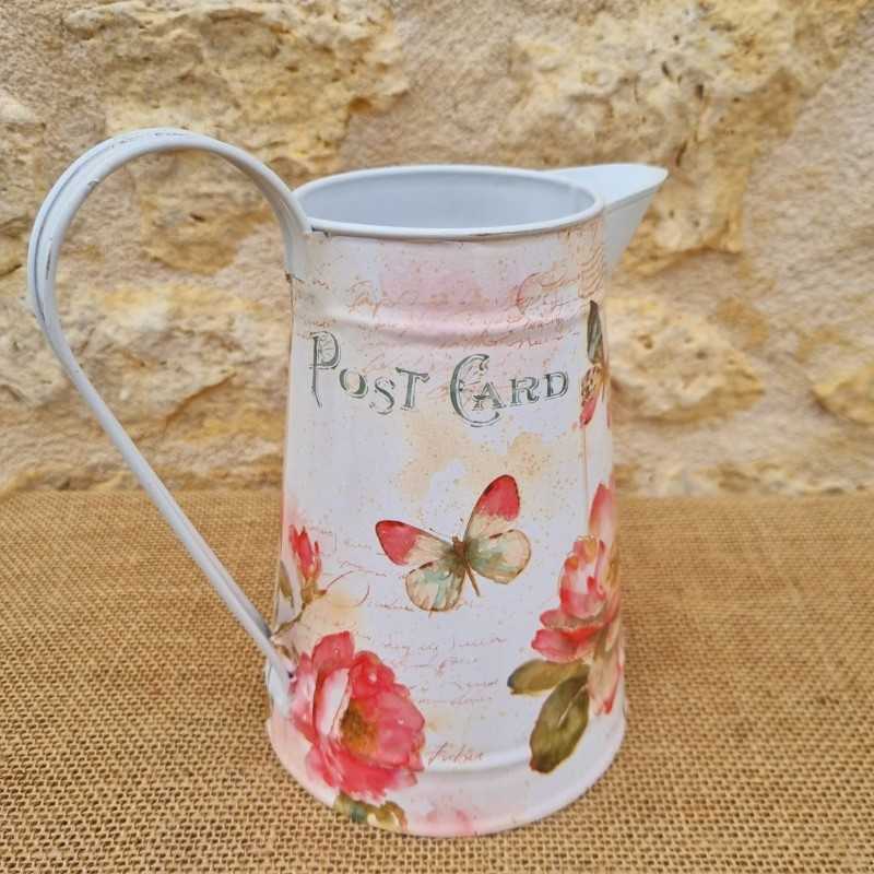 Decorative vintage-style jug with script motifs, butterflies, and flowers €18.90 LEZARD DU JARDIN