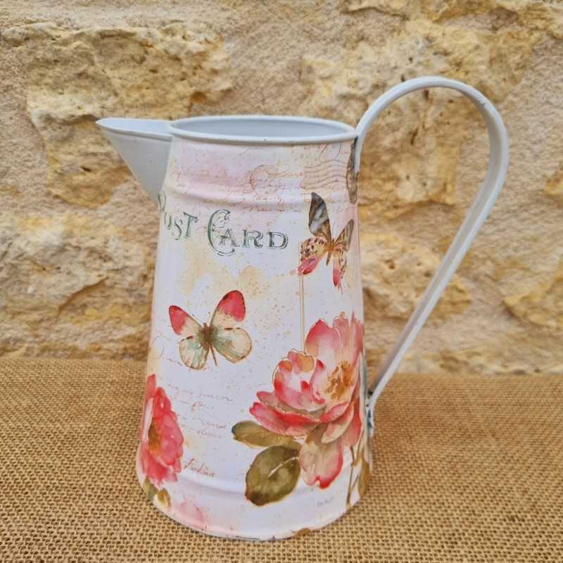 Decorative vintage-style jug with script motifs, butterflies, and flowers €18.90 LEZARD DU JARDIN