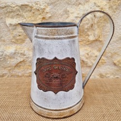 Decorative Vintage-Style Pitcher with Ornate Plaque Motifs