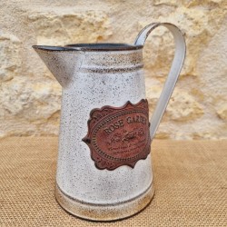 Decorative Vintage-Style Pitcher with Ornate Plaque Motifs
