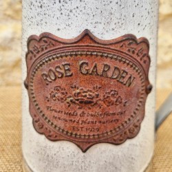 Decorative Vintage-Style Pitcher with Ornate Plaque Motifs