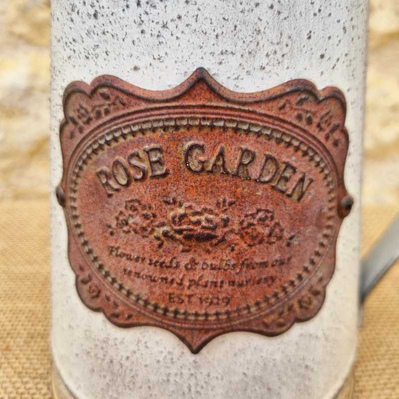 Decorative Vintage-Style Pitcher with Ornate Plaque Motifs