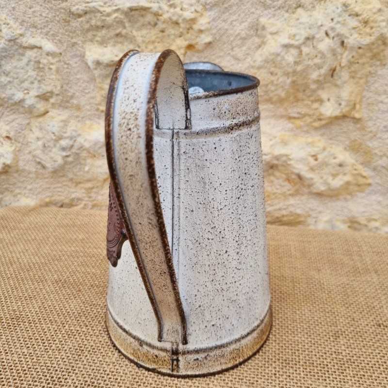 Decorative Vintage-Style Pitcher with Ornate Plaque Motifs