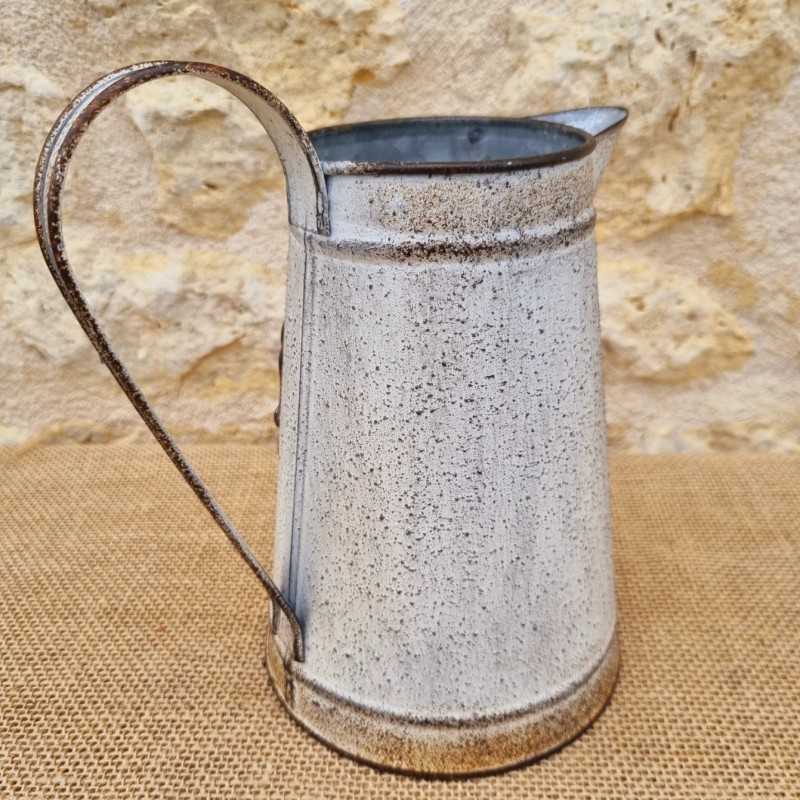 Decorative Vintage-Style Pitcher with Ornate Plaque Motifs