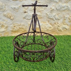 Brown tricycle plant stand with lower basket €49.90 LEZARD DU JARDIN
