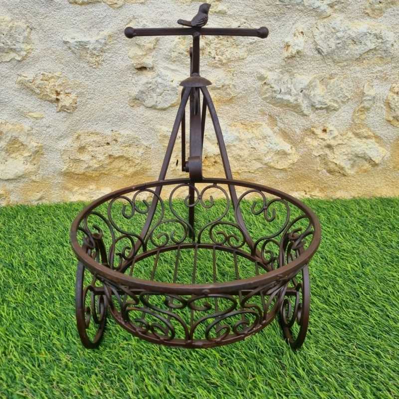 Brown tricycle plant stand with lower basket €49.90 LEZARD DU JARDIN
