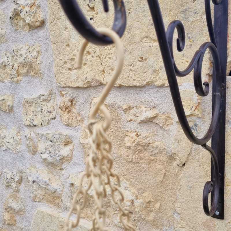 Patinated beige and brown iron hanging plant basket