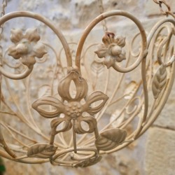Patinated beige and brown iron hanging plant basket