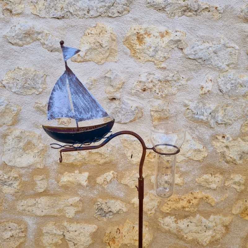 Metal garden decorative rain gauge with a boat motif, 134 cm tall, front view