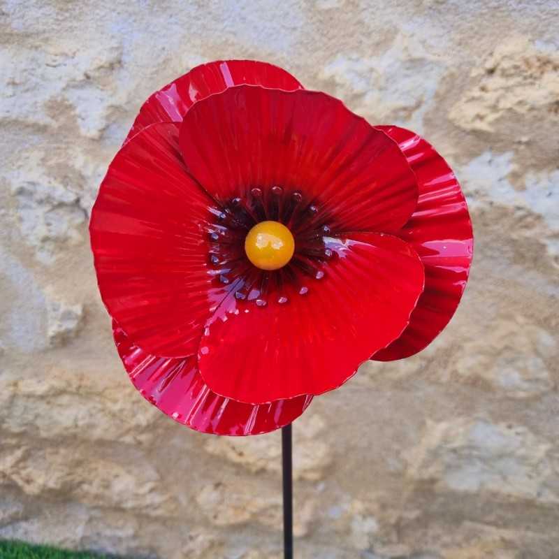Iron poppy on a stake