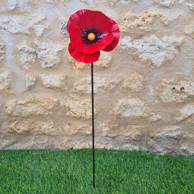 Iron poppy on a stake