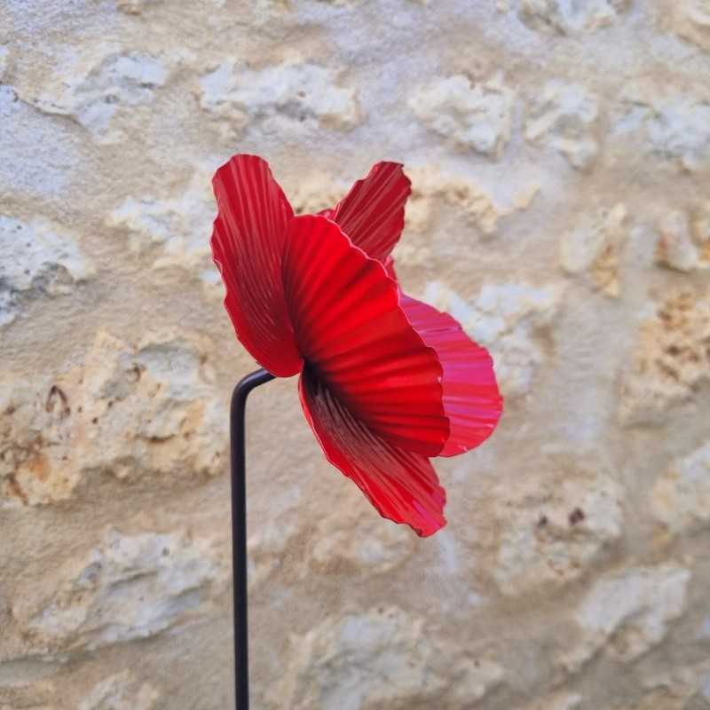Iron poppy on a stake