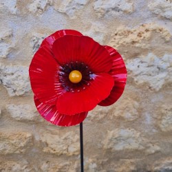 Iron poppy on a stake