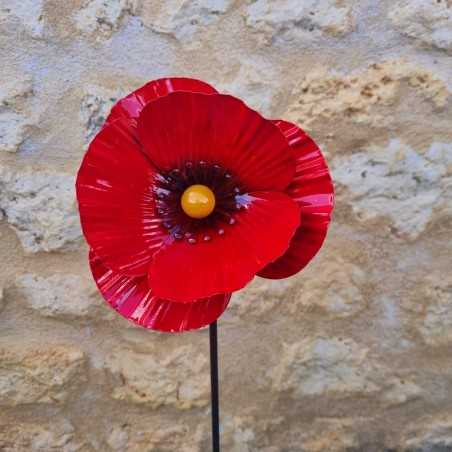 Iron poppy on a stake
