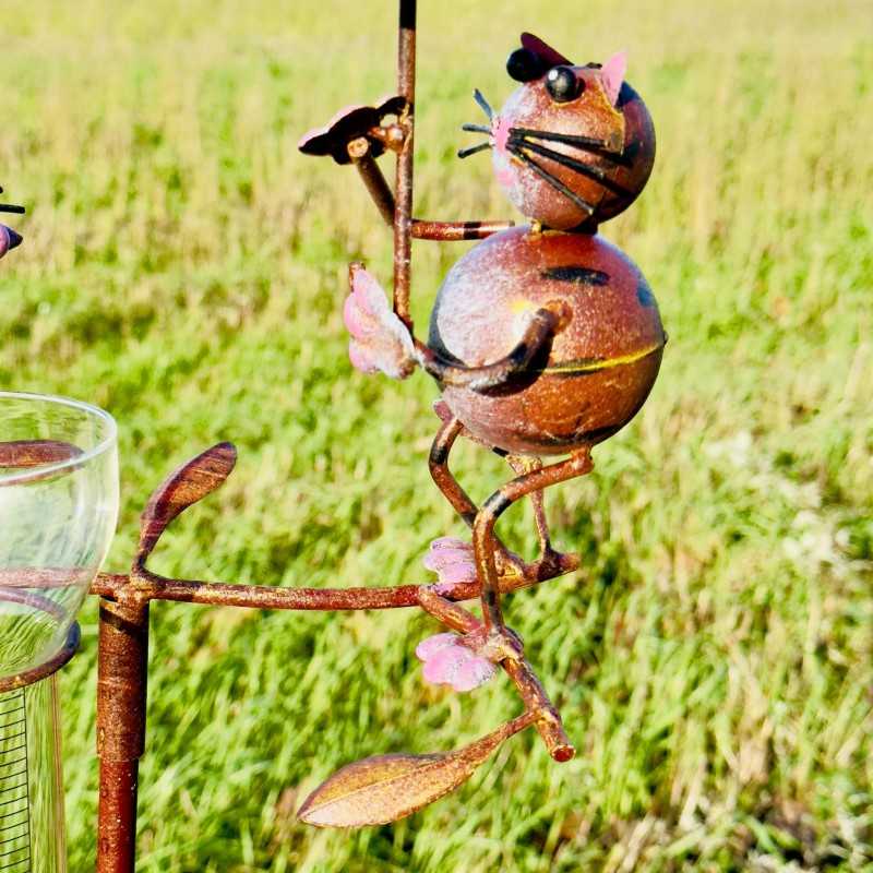 Cute decorative cat and mouse rain gauge for the garden. -LDJ.