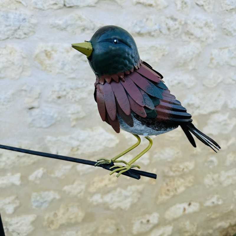 Close-up view of colorful metal bird garden mobile H133