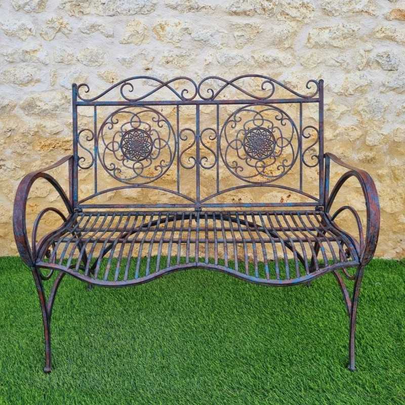 Patina-finished wrought-iron garden bench