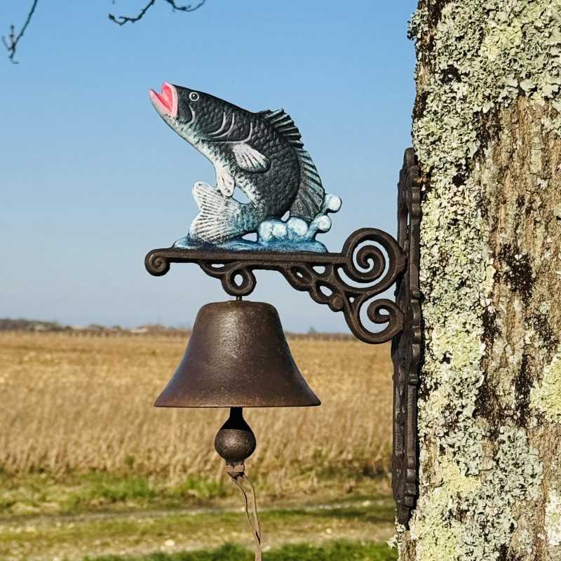 Cast iron wall bell with fish motif, side view