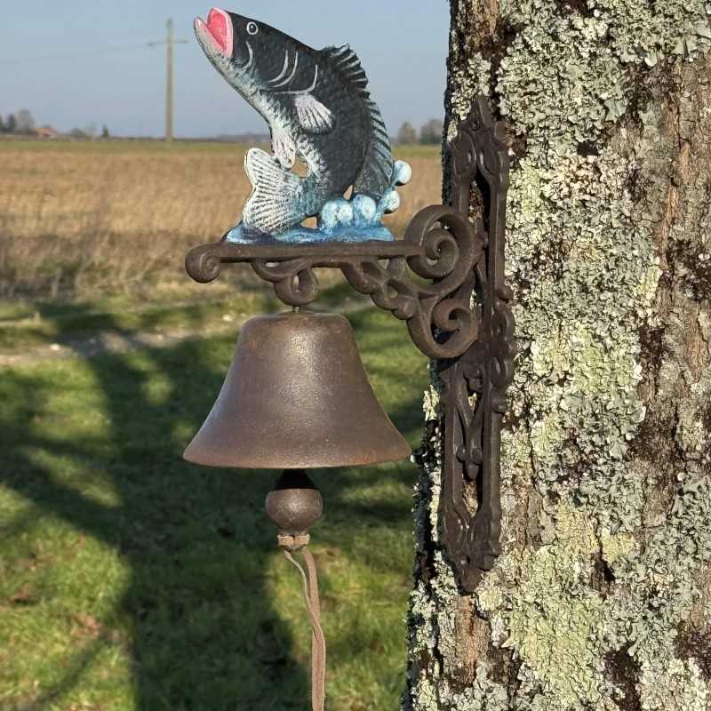 Close-up view of the cast iron bell with its 30 cm rope