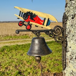 large bell with airplane close-up view