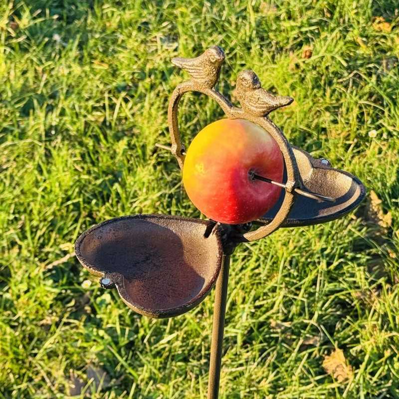 Bird feeder on a metal stake in a garden, standing 108 cm tall