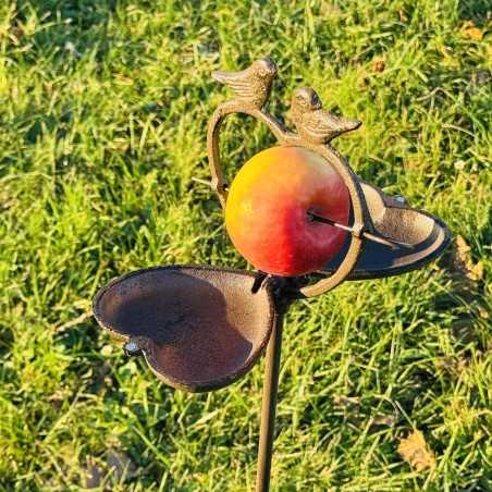 Bird feeder on a metal stake in a garden, standing 108 cm tall