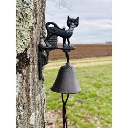 Cast-iron wall bell with a black cat – Close-up view of colorful feline décor