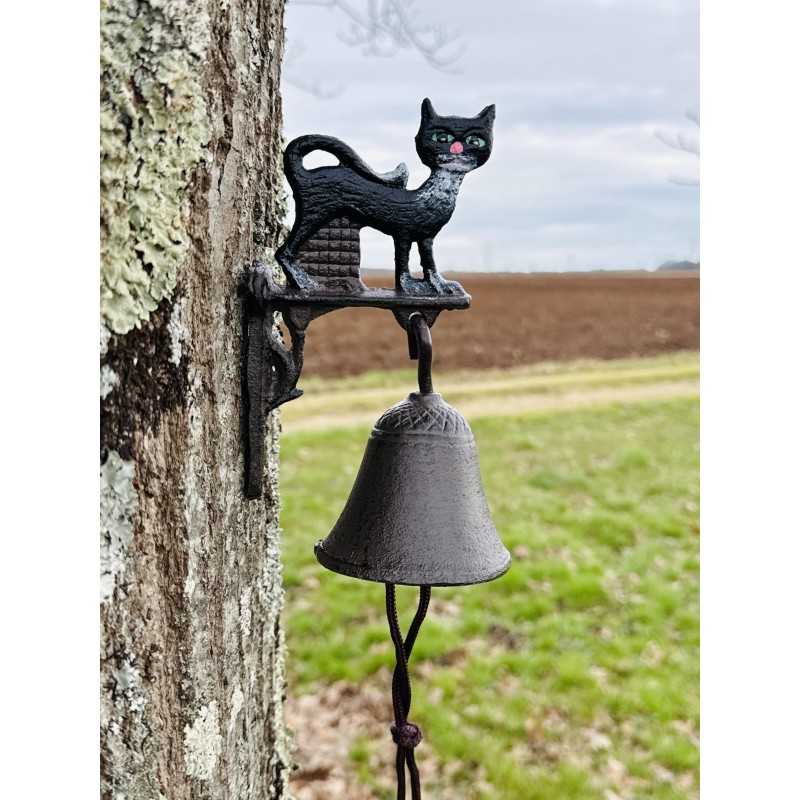 Cast-iron wall bell with a black cat – Close-up view of colorful feline décor