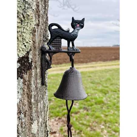 Cast-iron wall bell with a black cat – Close-up view of colorful feline décor